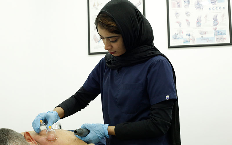 Cupping therapy treatment in progress